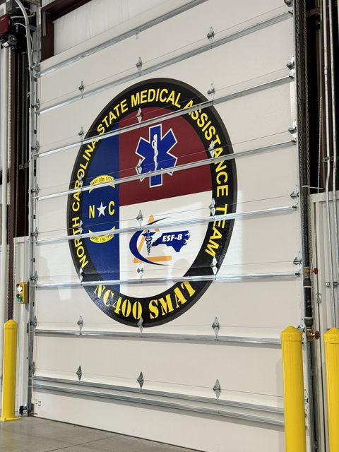 NC400 State Medical Assistance Team emblem on a bay door
